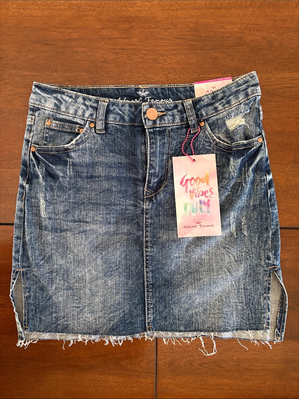 Almost Famous Washed Blue Denim high waisted Mini Skirt with Raw Hem NWT